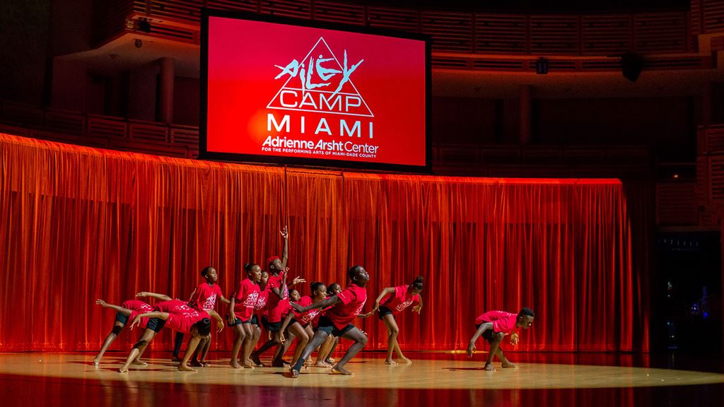 AileyCamp Miami dancers performing on stage.